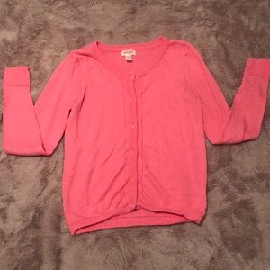 A pink button down sweater!